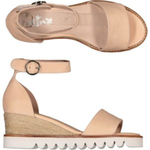 a nude coloured sandal sitting on a wedge sole unit with espadrille styling.