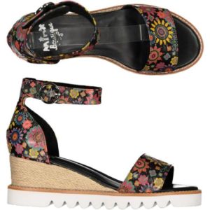 a gorgeous floral print on a black background. Strappy summer sandal on a wedge sole unit.